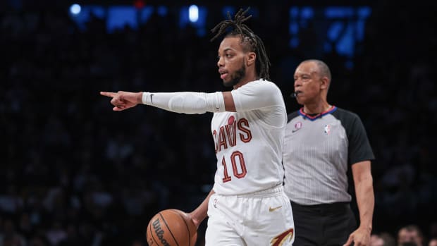Mar 21, 2023; Brooklyn, New York, USA; Cleveland Cavaliers guard Darius Garland (10) dribbles up court during the first half against the Brooklyn Nets at Barclays Center.